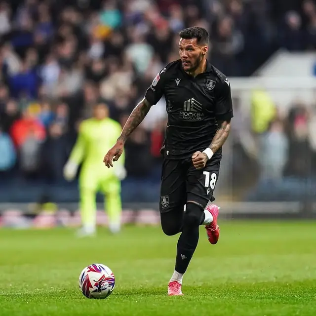 Marvin Johnson in Sheffield Wednesday's black away kit