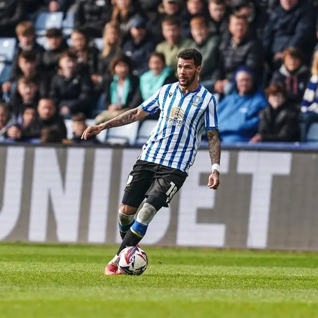 Marvin Johnson on the ball in front of the home crowd