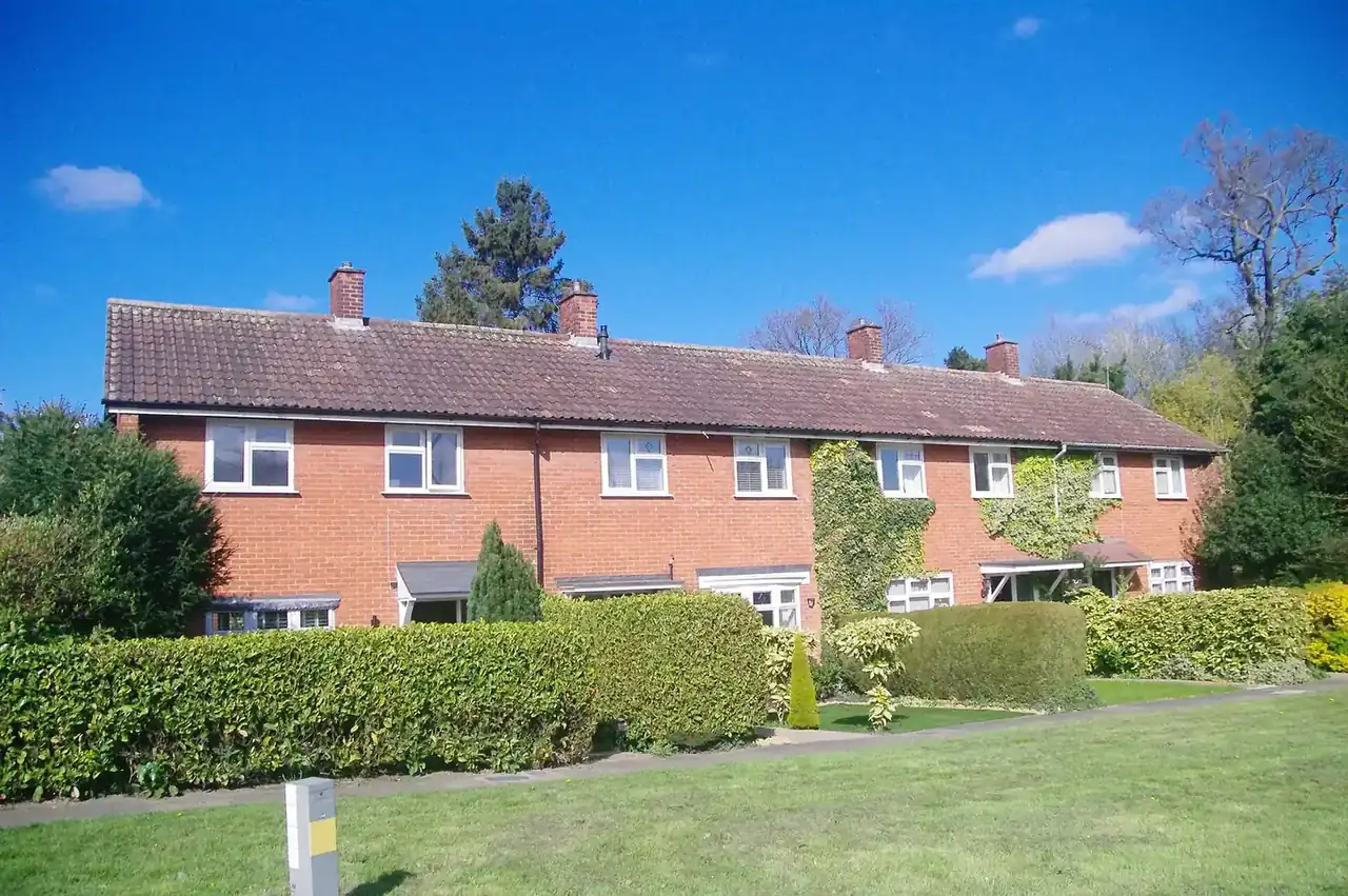 A row of terraced houses with slate roofs